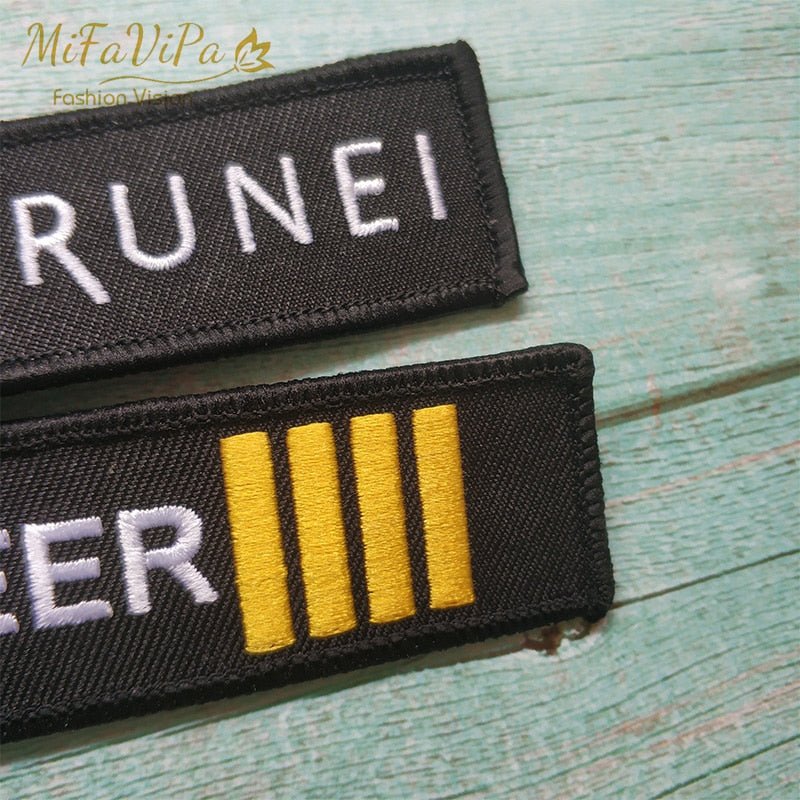 A ROYAL BRUNEI SIDE B ENGINEER EMBROIDERY KEY CHAIN - PILOTSX