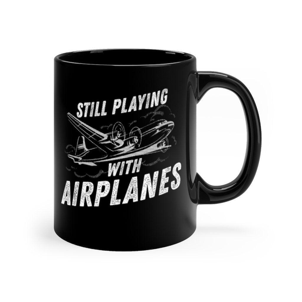 STILL PLAYING WITH AIRPLANES DESIGNED - MUG Printify